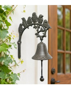 Iron Birds Perched Over Bell